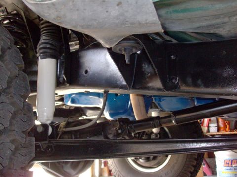 1978 Ford Bronco - Underside view of a 1978 Ford Bronco, detailing its mechanical components and frame.