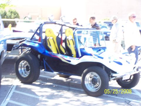 1972 Ford Ranchero - Custom dune buggy with flame paint and racing seats seen at a car show.