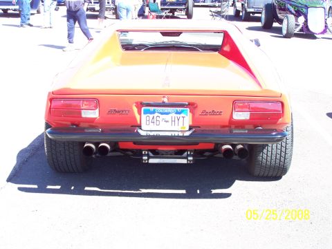 1972 Ford Ranchero - Rear view of a De Tomaso Pantera, a mid-engine sports car, at a car show.