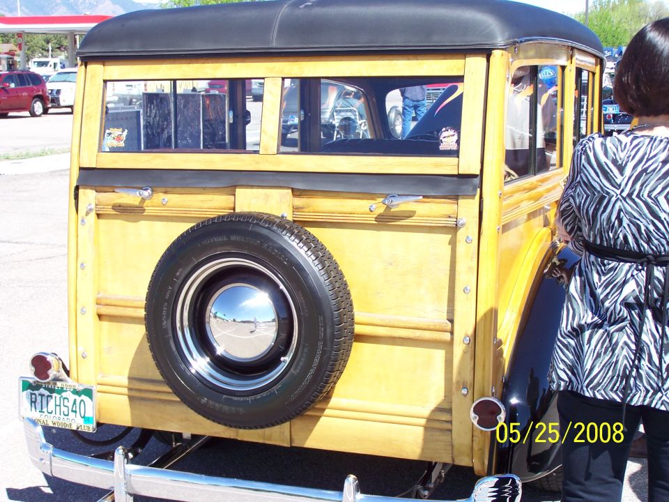 woodie station wagon with spare tire on back, license plate RICH540