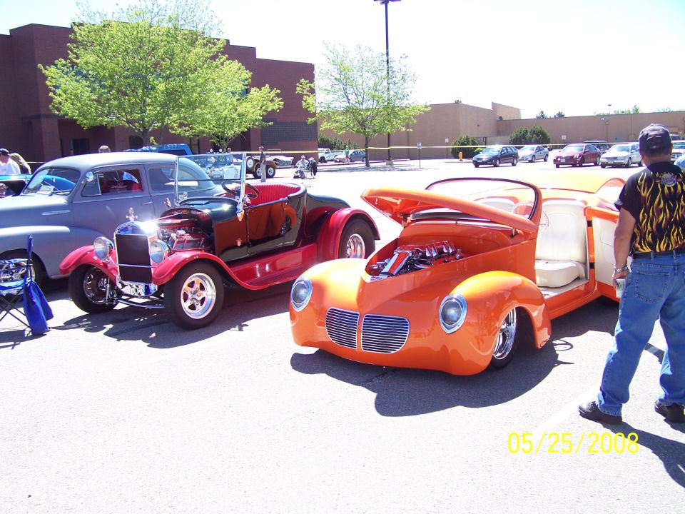 Orange hot rod with doors and hood open, showing white interior and engine. Date stamp 05/25/2008