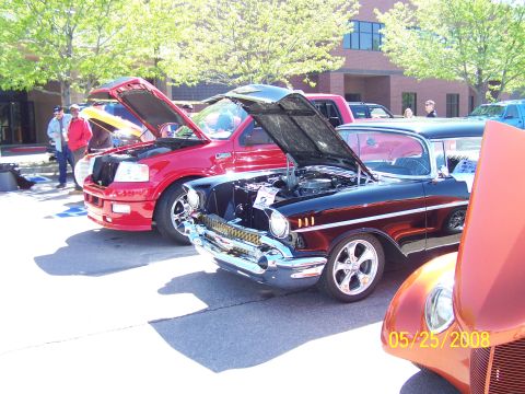 1972 Ford Ranchero - Several vehicles are displayed with their hoods open at an outdoor car show.