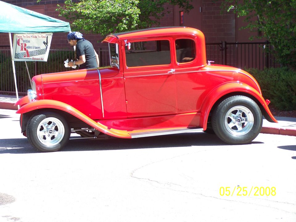 Red coupe hot rod side view. Date stamp reads 05/25/2008