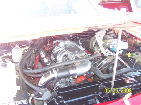1972 Ford Ranchero - A detailed view of a modified engine bay, a prominent chrome intake manifold and polished components. The photo was taken on May 25, 2008.