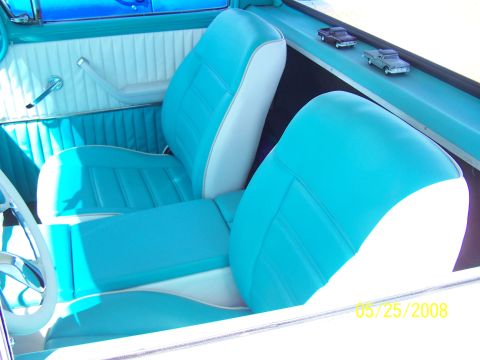 1972 Ford Ranchero - The interior of a vehicle features turquoise and white upholstery, a chrome door handle, and a date stamp of 05/25/2008.