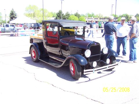 1972 Ford Ranchero - This vintage pickup truck, likely from the late 1920s, was seen at an outdoor car show.