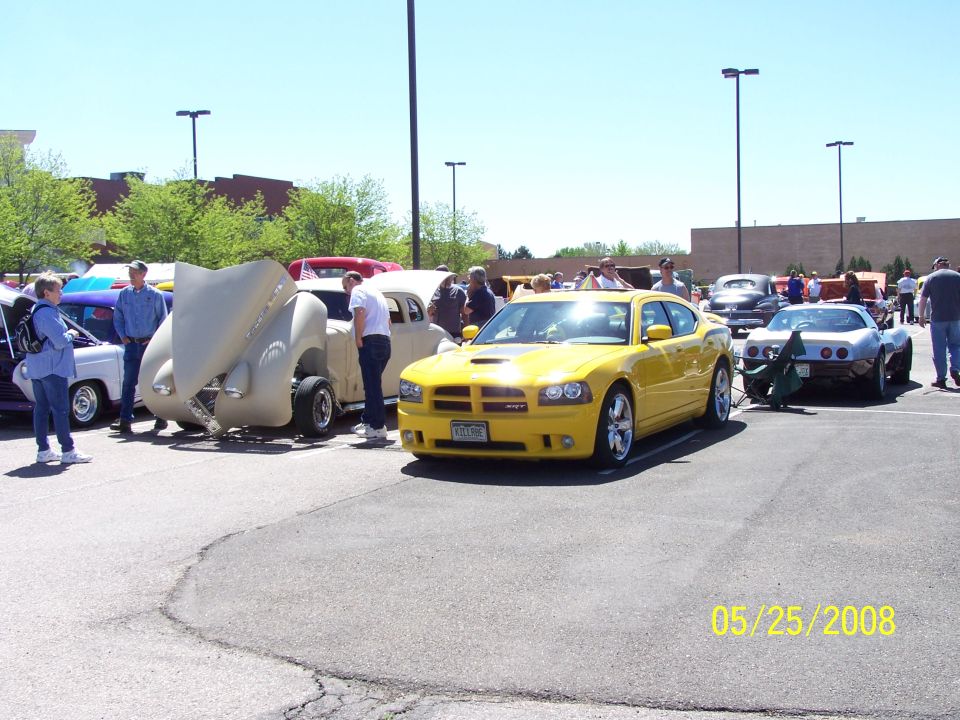 Yellow Dodge Charger SRT8 front view at car show