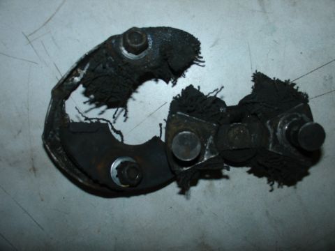 1978 Ford Bronco - This is a damaged automotive part, likely from a vehicle's drivetrain or suspension system.
