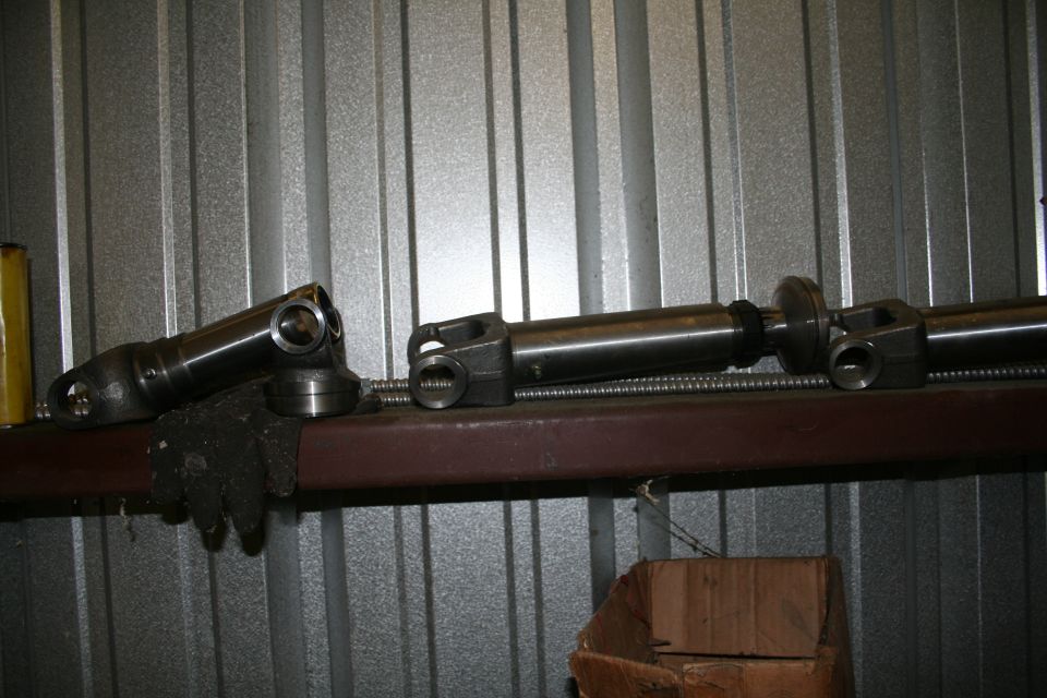 Far left is a 1350 6" slip yoke for 3"x 0.120 wall DOM for my intermediate shaft
Next to it is the yoke for the other end of the shaft, 1350 as well
Then are the two long travel yokes that are 1350 as well. They will attach to the transfer case, with the end at the Rockwells being 1410's. DOM used is 0.134" wall, pretty damn thick for a shaft.

My Rockwell pinion flange sits 6" lower than the NP205 yoke centerline. The first 6.25 " of compression will require 1" of slip/compression in the yoke, allowing the rest to be for extension/droop, since I have only 6" of possible compression. Any further upwards travel results in extension of the slip joint.