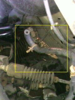 2002 Nissan SE-R - A close-up view of a vacuum hose connection, possibly in an engine bay.