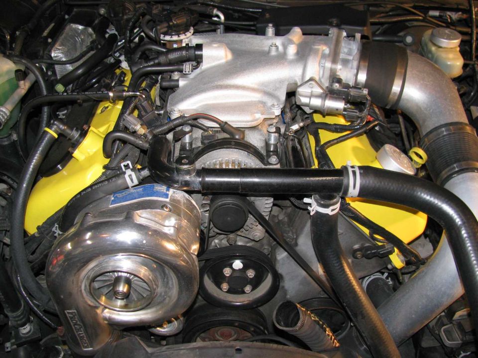 Swapping the 3.80 pulley for a 3.70" pulley. Note: These pics were taken before the first detail session, hence the dirty engine bay.