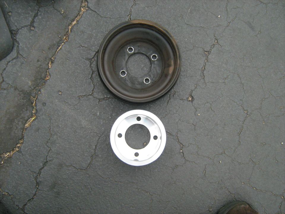 March UD Pulley next to stock pulley