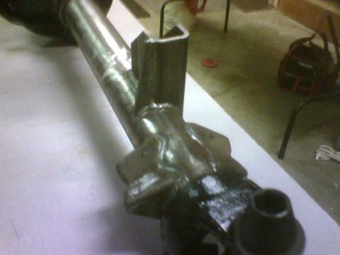 1993 Ford Bronco - Modified axle housing with custom bracket, likely for off-road vehicle modification.