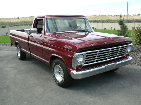 1967 Ford F-100 - 1967 Ford F-100 pickup truck with a chrome grille and bumper.