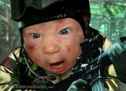 2000 Mercury Grand Marquis - A baby dressed as a soldier, with a determined look, aims a rifle forward.