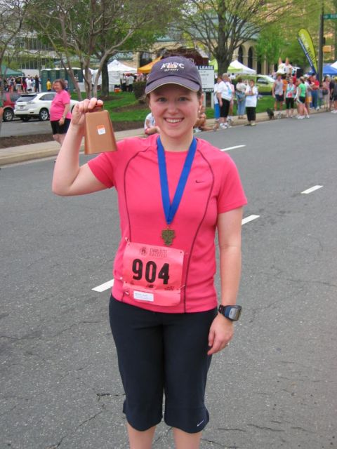 1985 Ford LTD Crown Victoria - Runner celebrates with a cowbell after finishing the Charlotte Half Marathon in 2008.
