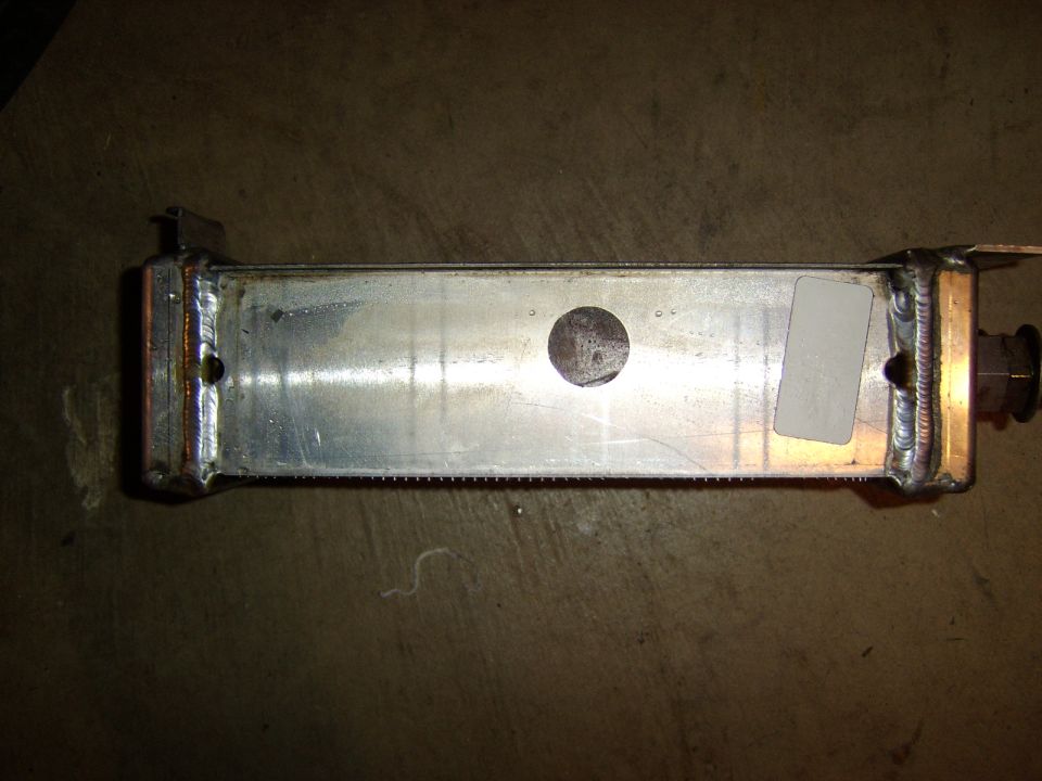 Welded aluminum intercooler or heat exchanger tank on concrete floor