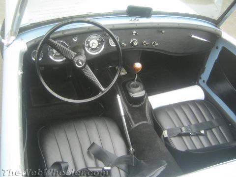 1968 Ford Mustang - Photo of an Austin-Healey Sprite interior and dashboard, not a technical document.