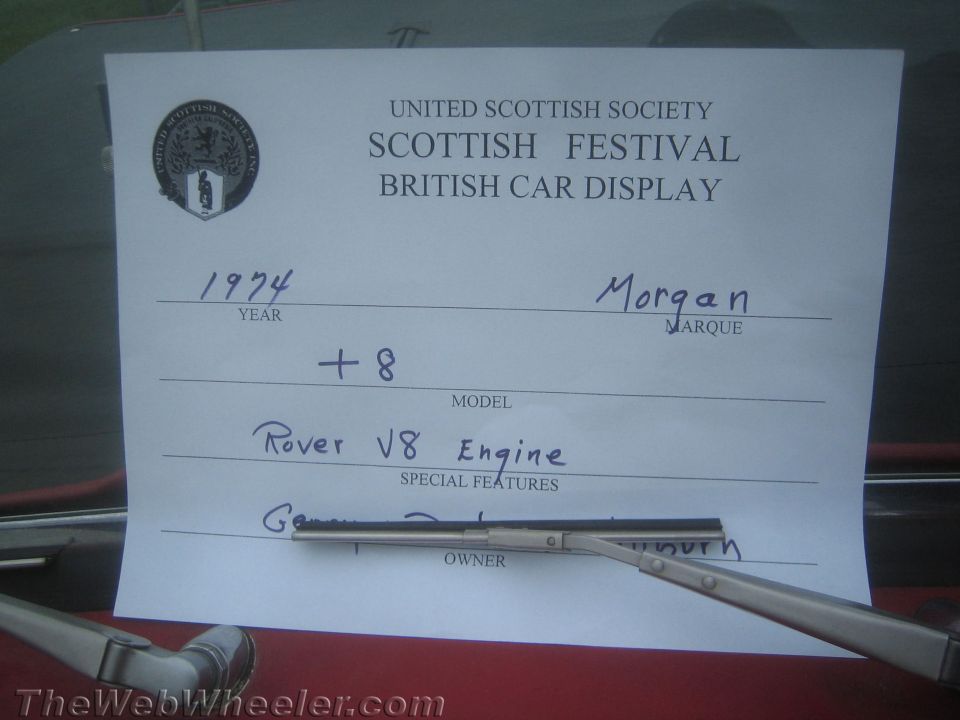 Handwritten Scottish Festival car-display card: 1974 Morgan Plus 8, Rover V8 engine
