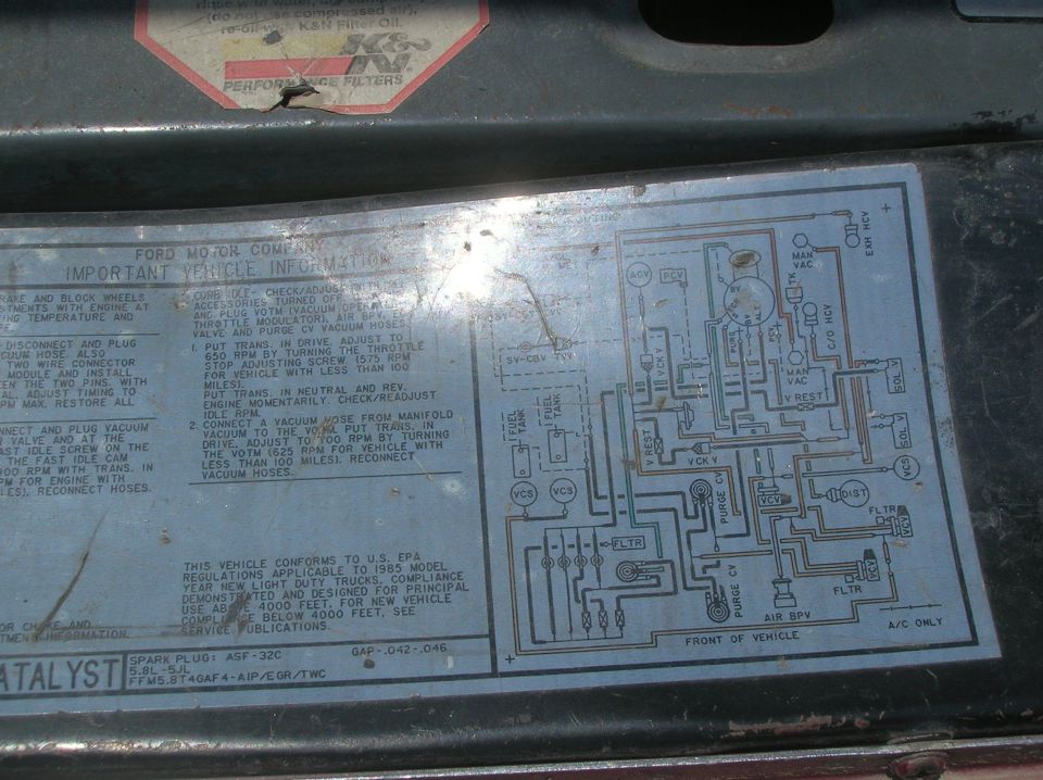Ford underhood vehicle emission control information decal with vacuum hose routing diagram