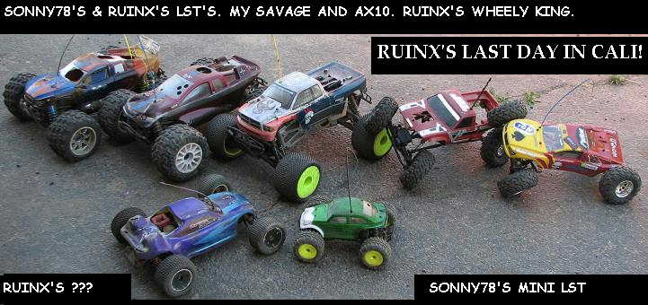 Several remote-controlled monster trucks parked on asphalt.