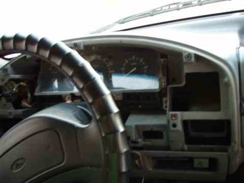 1995 Ford F-150 - Interior view of a 1995 Ford F-150 dashboard, showing the steering wheel and instrument cluster.