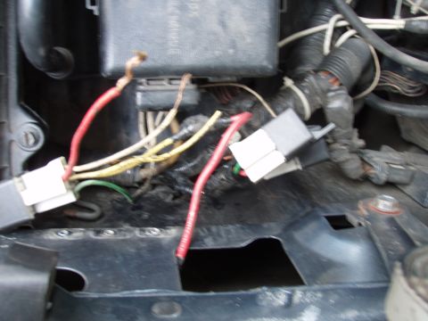 1995 Ford F-150 - This image shows a close-up view of a vehicle's complex wiring harness and electrical components.