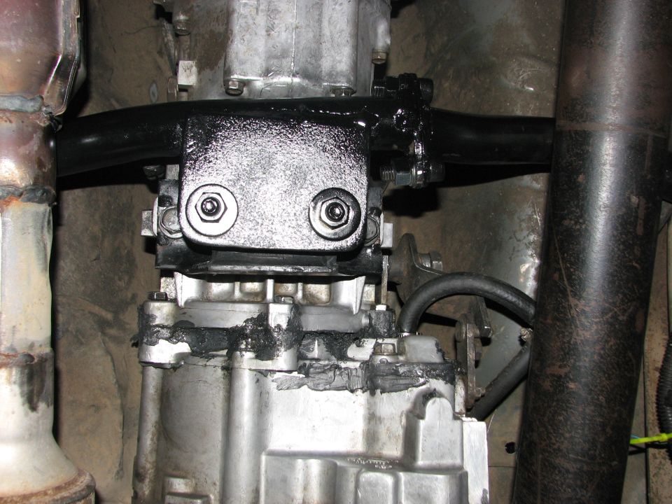 Transmission crossmember and drivetrain components with Supermotors logo