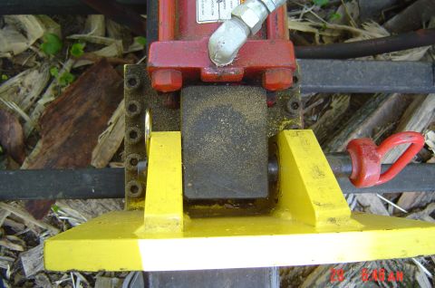 1946 Ford F1 - Close-up of a hydraulic jack part, showing its mechanical components and construction.