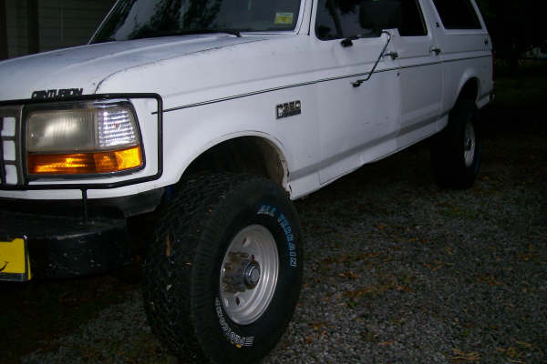White 1992 Ford C-350 Centurion Conversions SUV, 3q front view