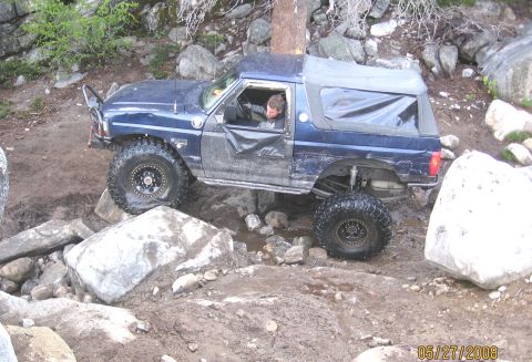 1994 Ford Bronco - This 1994 Ford Bronco is shown off-roading on a challenging rocky trail.
