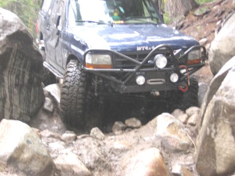 1994 Ford Bronco - This SUV is equipped for off-road adventures, with large tires and a reinforced front end.