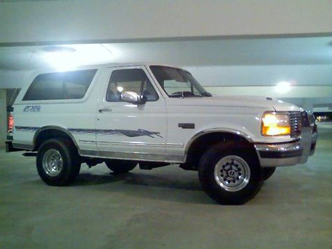 1996 Ford Bronco - This white 1996 Ford Bronco is seen from a three-quarter front view in a parking garage.