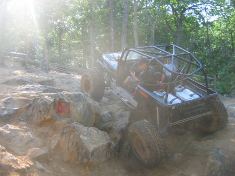 1992 Ford Mustang - Custom off-road buggy navigates a challenging rocky terrain during an outdoor adventure.