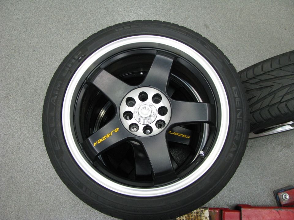 Black Kazera rims with silver lip and General tires