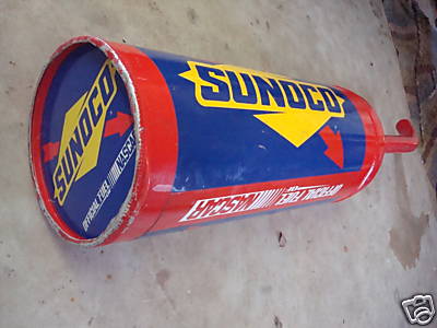 1993 Ford C-350 (Centurion Conversions) - This cylindrical sign features the Sunoco logo and NASCAR branding, indicating its association with official fuel sponsorship.