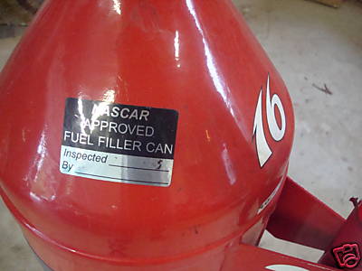 1993 Ford C-350 (Centurion Conversions) - Red fuel filler can with NASCAR approved sticker and a white '16' graphic.