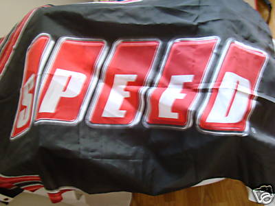 1993 Ford C-350 (Centurion Conversions) - A car cover displaying the word "SPEED" in large, bold lettering.