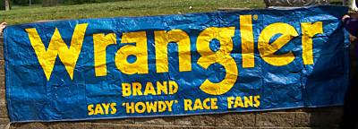 1993 Ford C-350 (Centurion Conversions) - A banner for Wrangler Brand is displayed, greeting race fans.