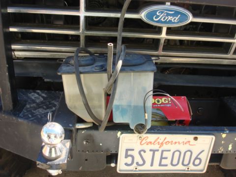 1983 Ford Bronco - there was no washer pump in Homer when i got him. The lines were all broken. i wanted to fix the over flow bottle i had so a swap was an ea…