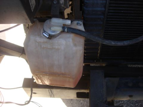 1983 Ford Bronco - Here is the old over flow bottle. it seen alot of miles and is ready to be retired.