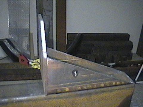 1992 Ford Bronco - A custom metal part, possibly a bumper section, is shown with visible rivets and a keyhole detail.