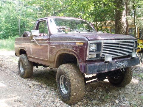 1980 Ford Bronco - This Ford Bronco is covered in mud, suggesting it has been used for off-roading.