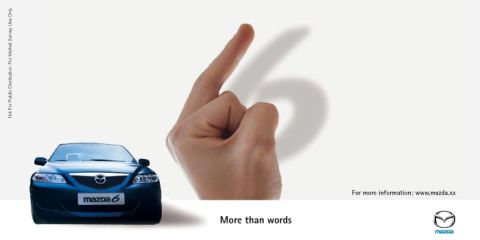 2003 Mazda 6 - 2003 Mazda 6 advertisement the car and a hand forming the number 6 shadow.