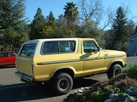 1978 Ford Bronco - This 1978 Ford Bronco is seen in a three-quarter front view under a clear blue sky.