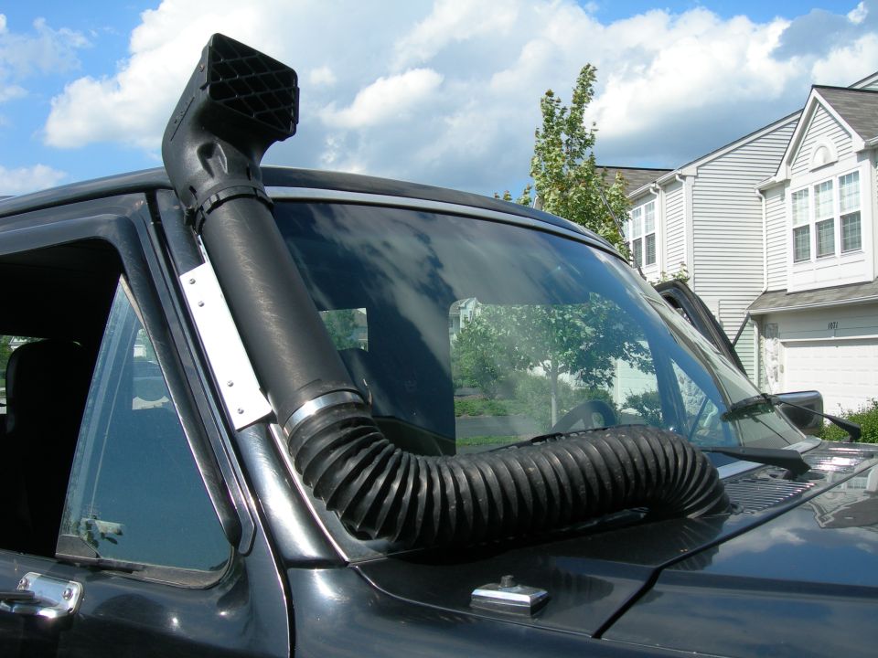 Black Ford Bronco with snorkel air intake on driver's side A-pillar.