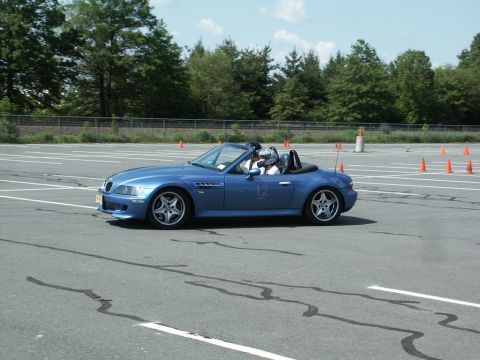 2001 Mercury Grand Marquis - Blue BMW Z3 convertible navigates an autocross course with orange cones visible.