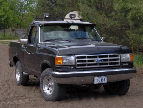 1987 Ford Bronco - This 1987 Ford Bronco is equipped with a roof rack and auxiliary lighting.