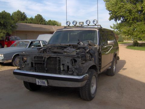 1987 Ford Bronco - This Ford Bronco is undergoing some work, with its front end disassembled and engine exposed.