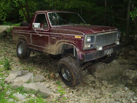 1980 Ford Bronco - This 1980 Ford Bronco navigates a challenging, rocky off-road path.